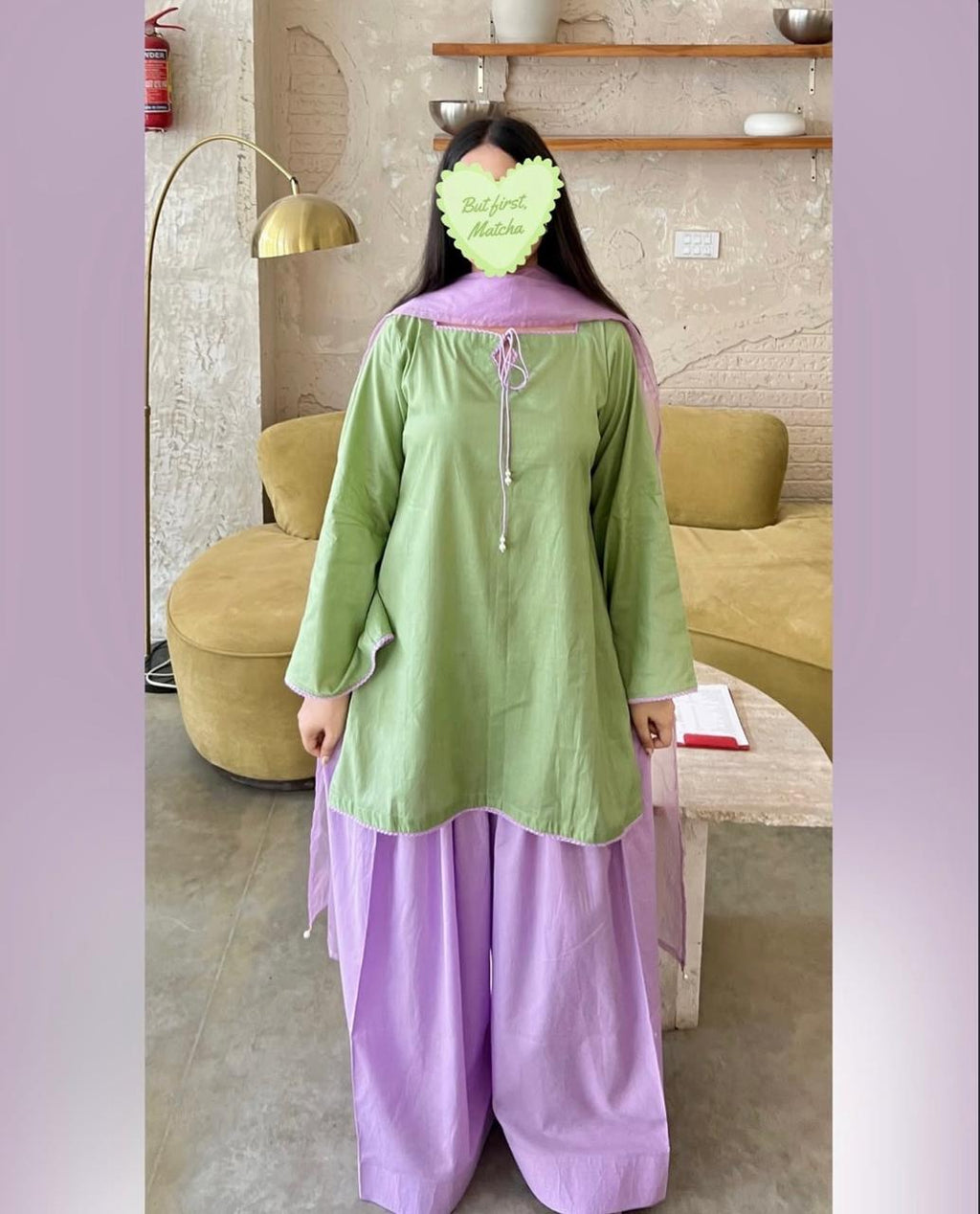 Detail shot of the Zarysh pistachio green and lavender lawn suit, highlighting the wide-leg trousers, pearl tassel neckline, and lace trim.